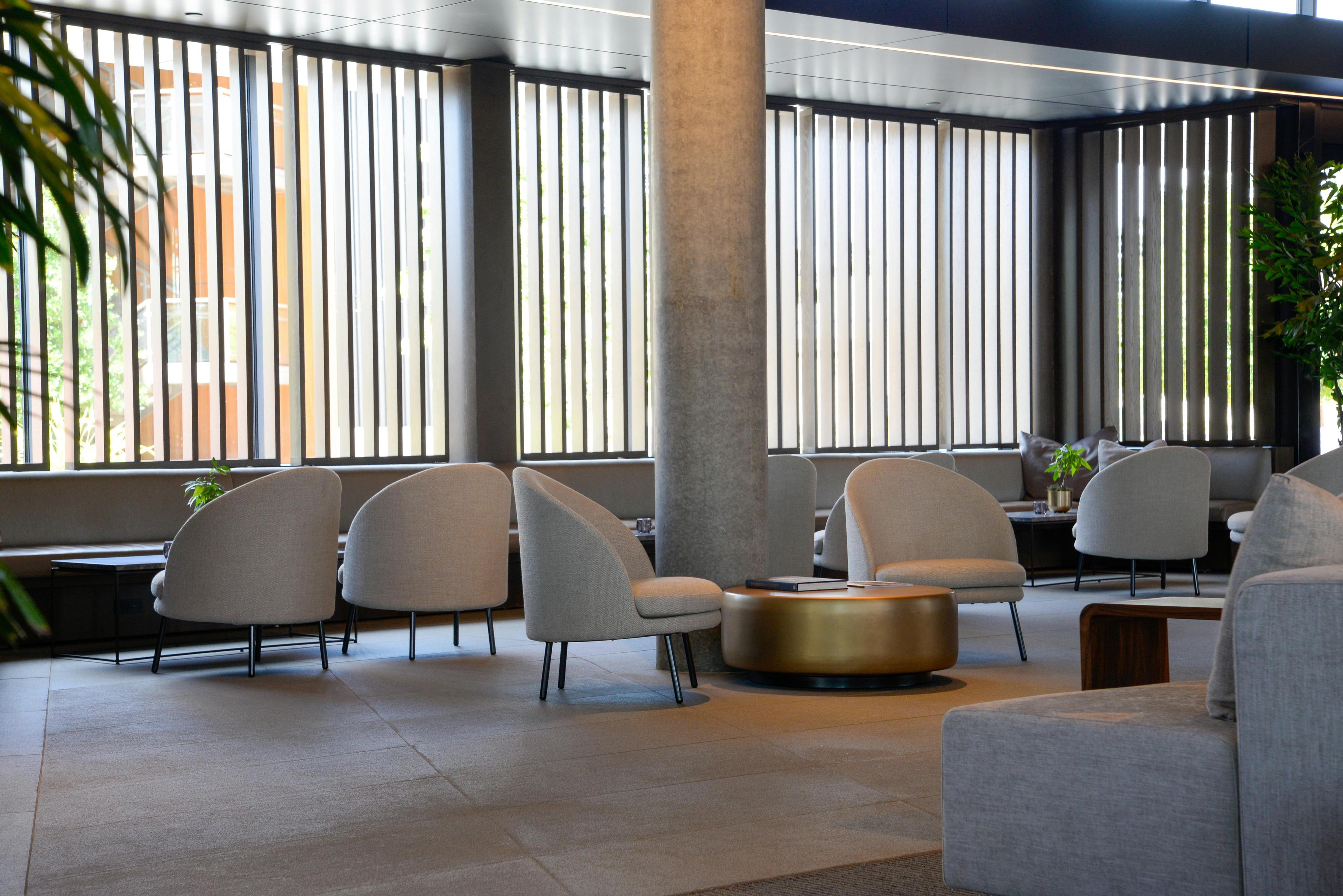 A private lounge in soft daylight — one line open for the whole journey.