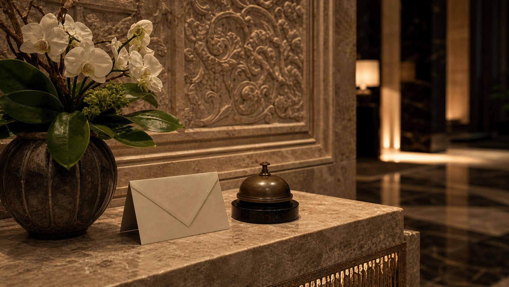 Resort lobby material study — stone wall, bronze bell, and flower arrangement.