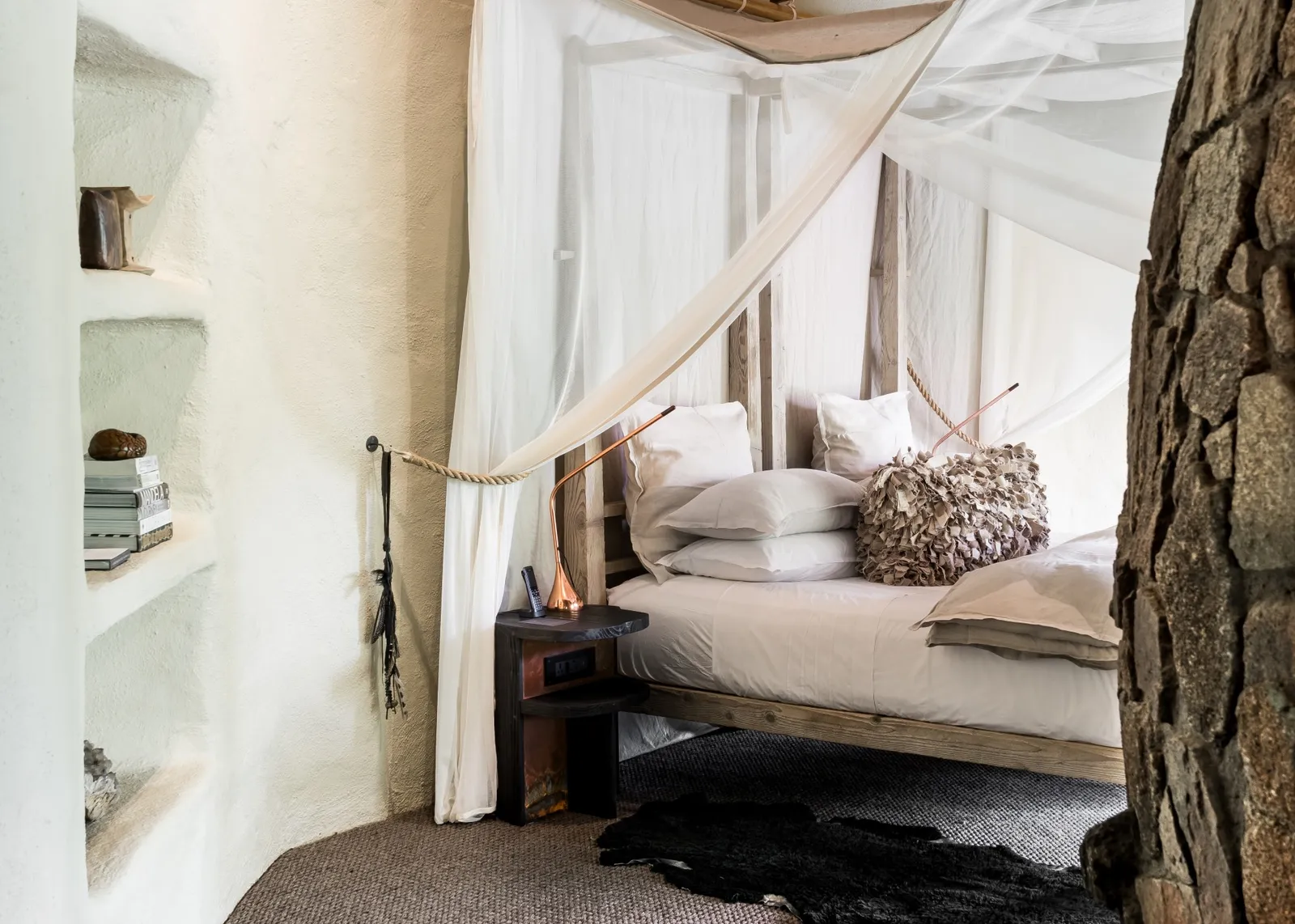 Guest suite interior at Singita Boulders Lodge