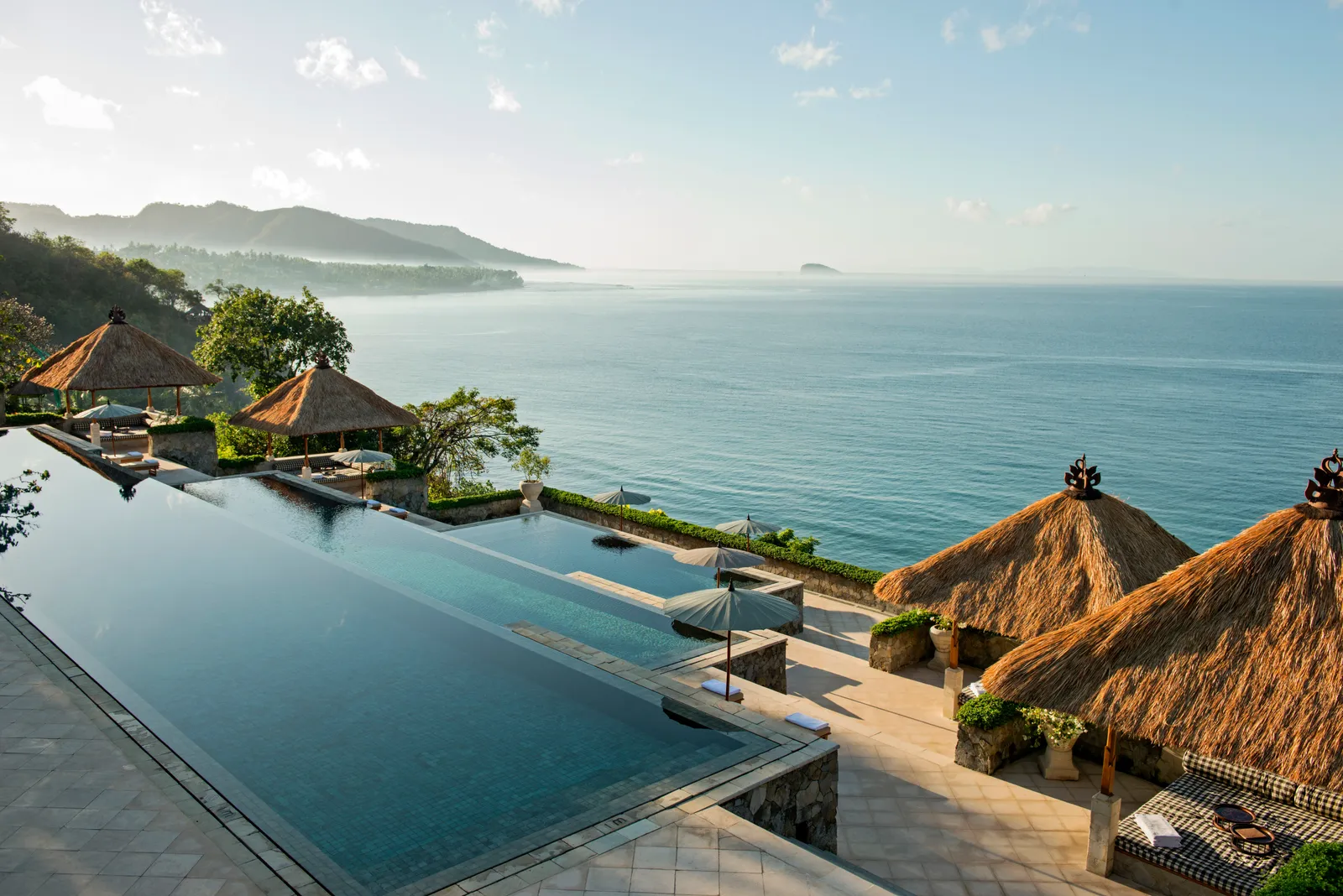Amankila's tiered emerald swimming pool overlooking the Lombok Strait
