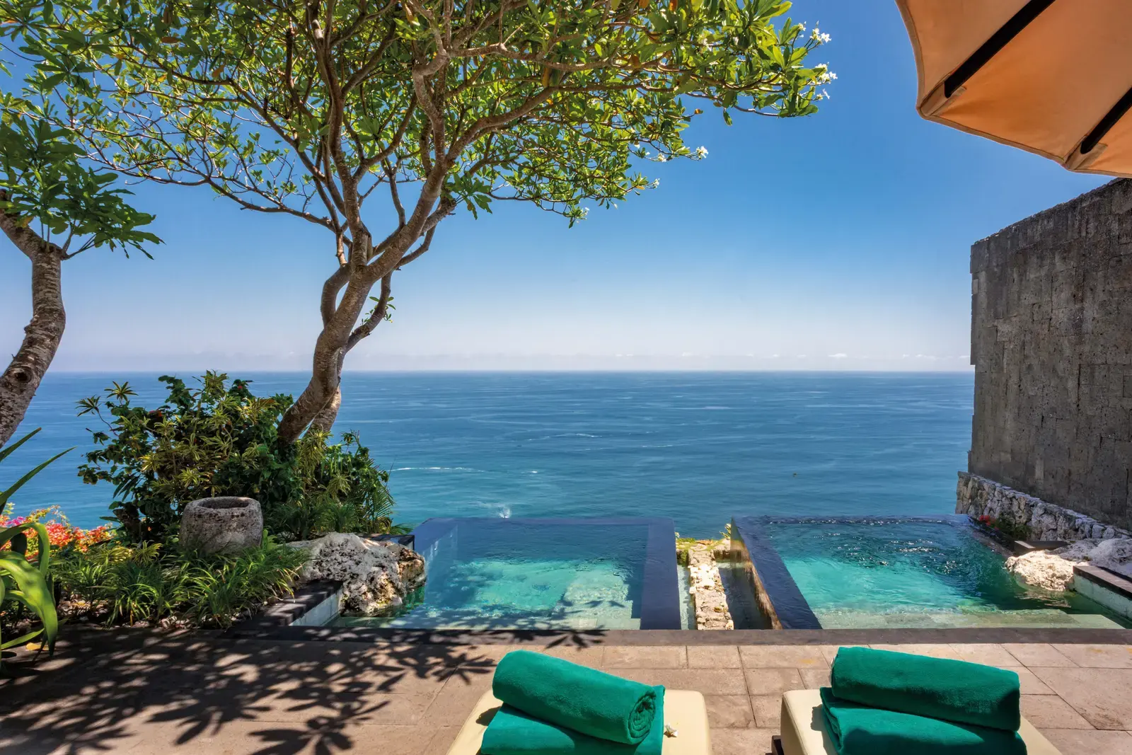 Private jacuzzi terrace at Bulgari Resort Bali overlooking the cliffside