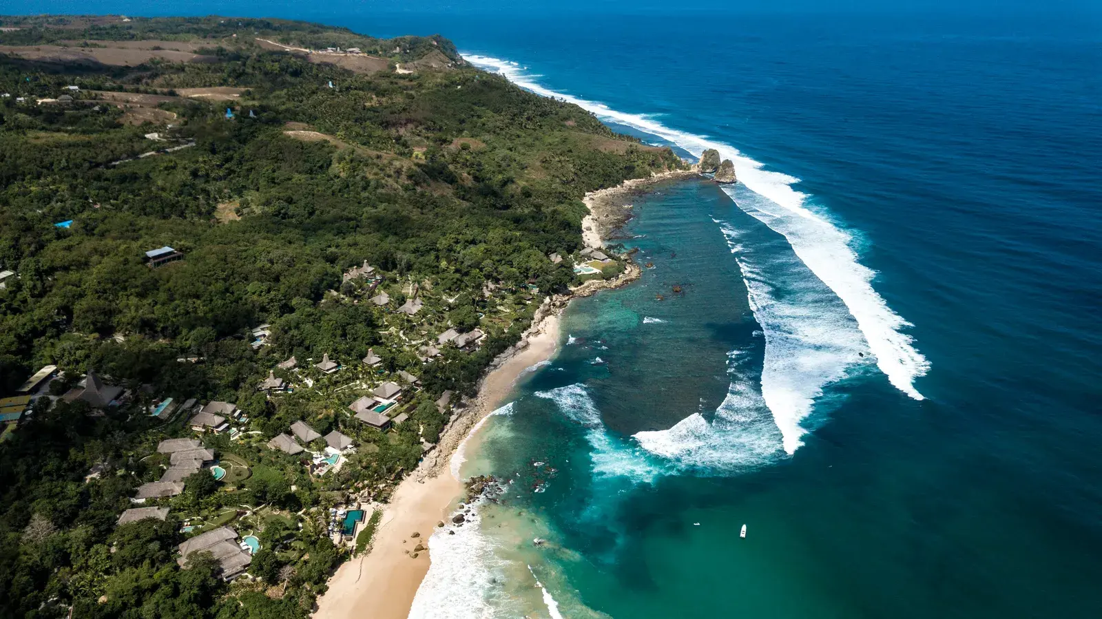 Aerial view of NIHI Sumba's coastline and reef break