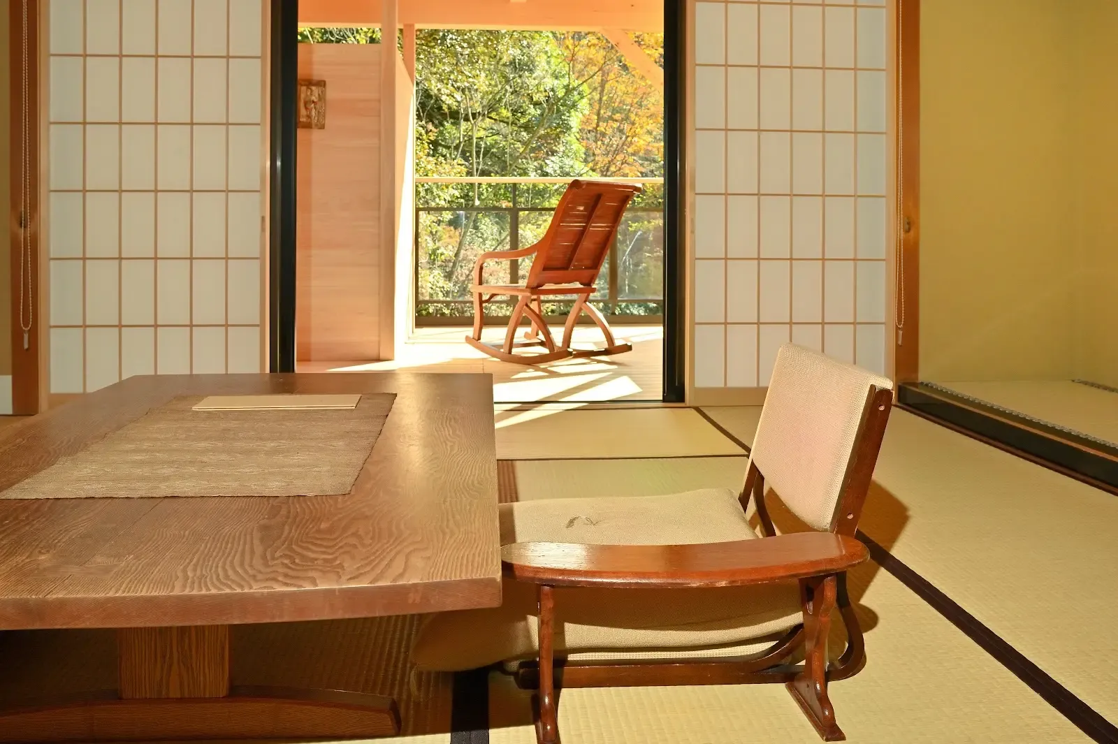 A private bath at Kayotei beside a forest waterfall setting.