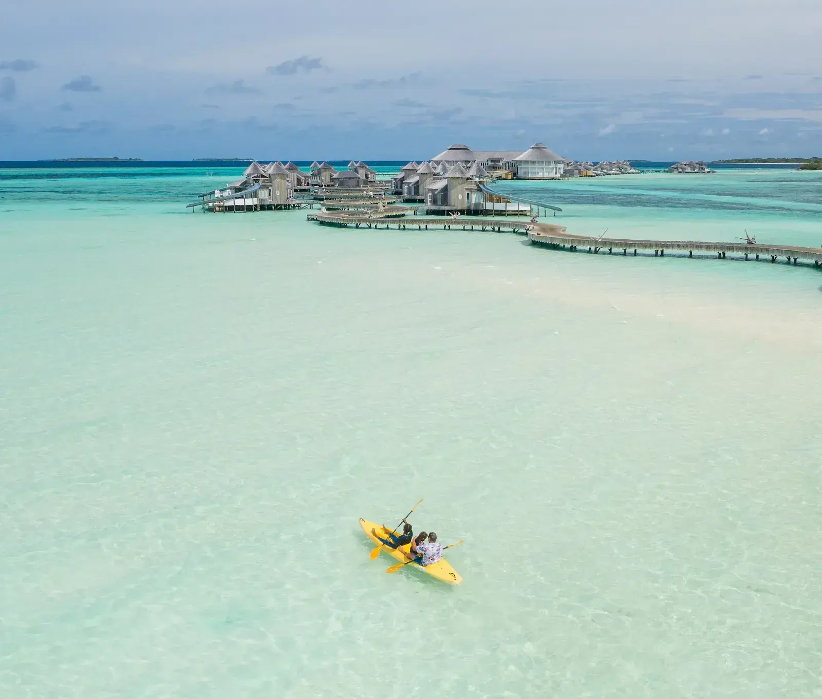 Family stay at a Soneva Jani water villa