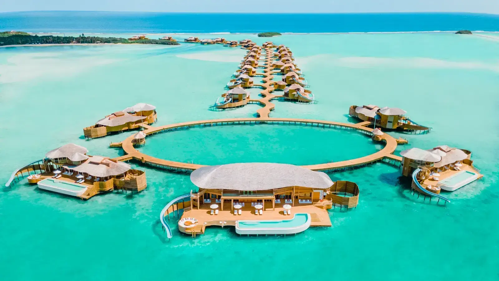 Aerial view of Soneva Jani's overwater villas