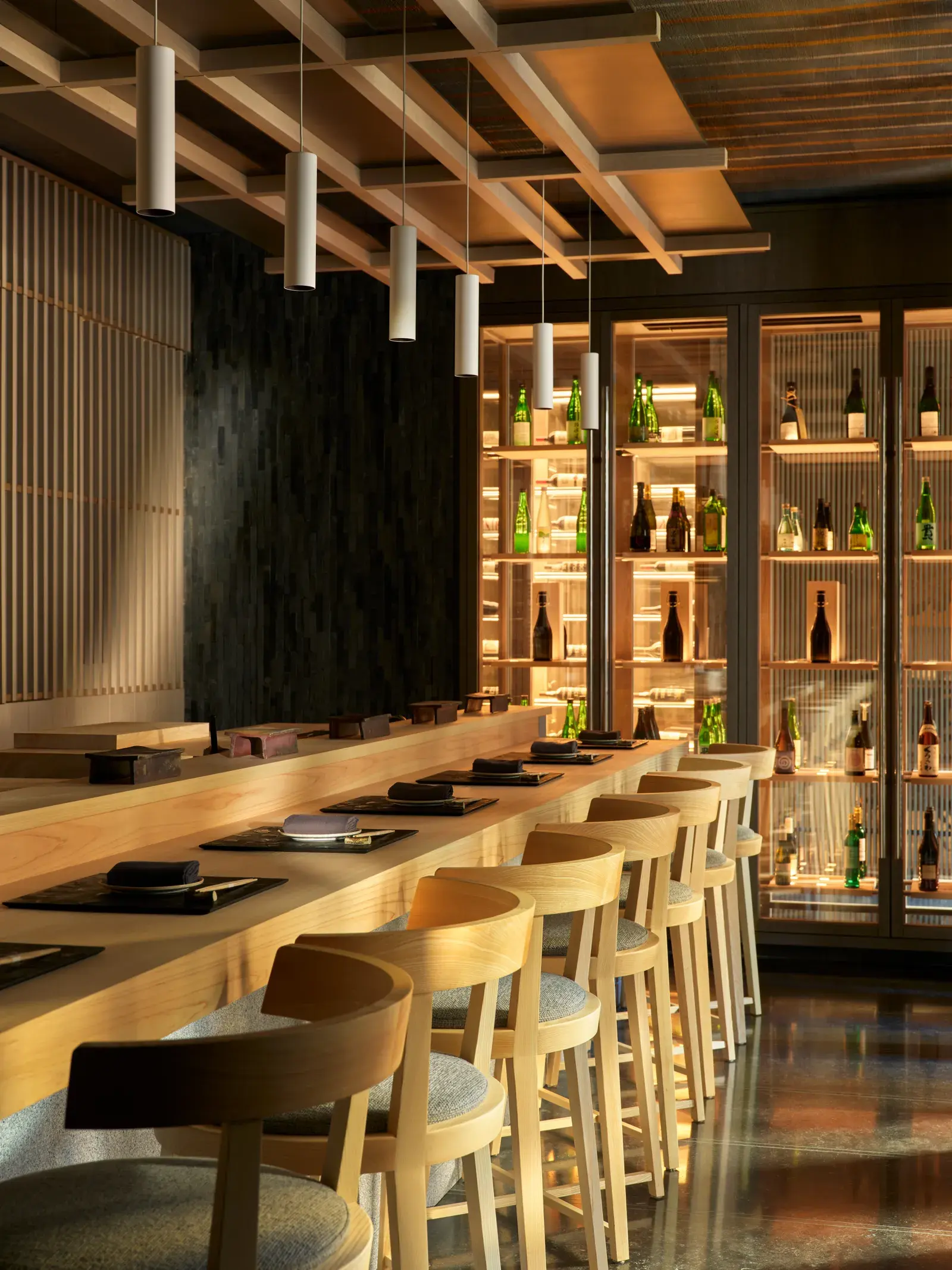 Nama restaurant counter and sake display at Aman New York