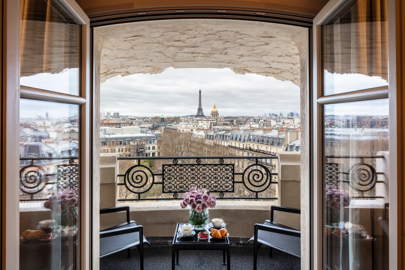 The Amour Suite 708 living room at Hôtel Lutetia, Paris, overlooking Saint-Germain rooftops