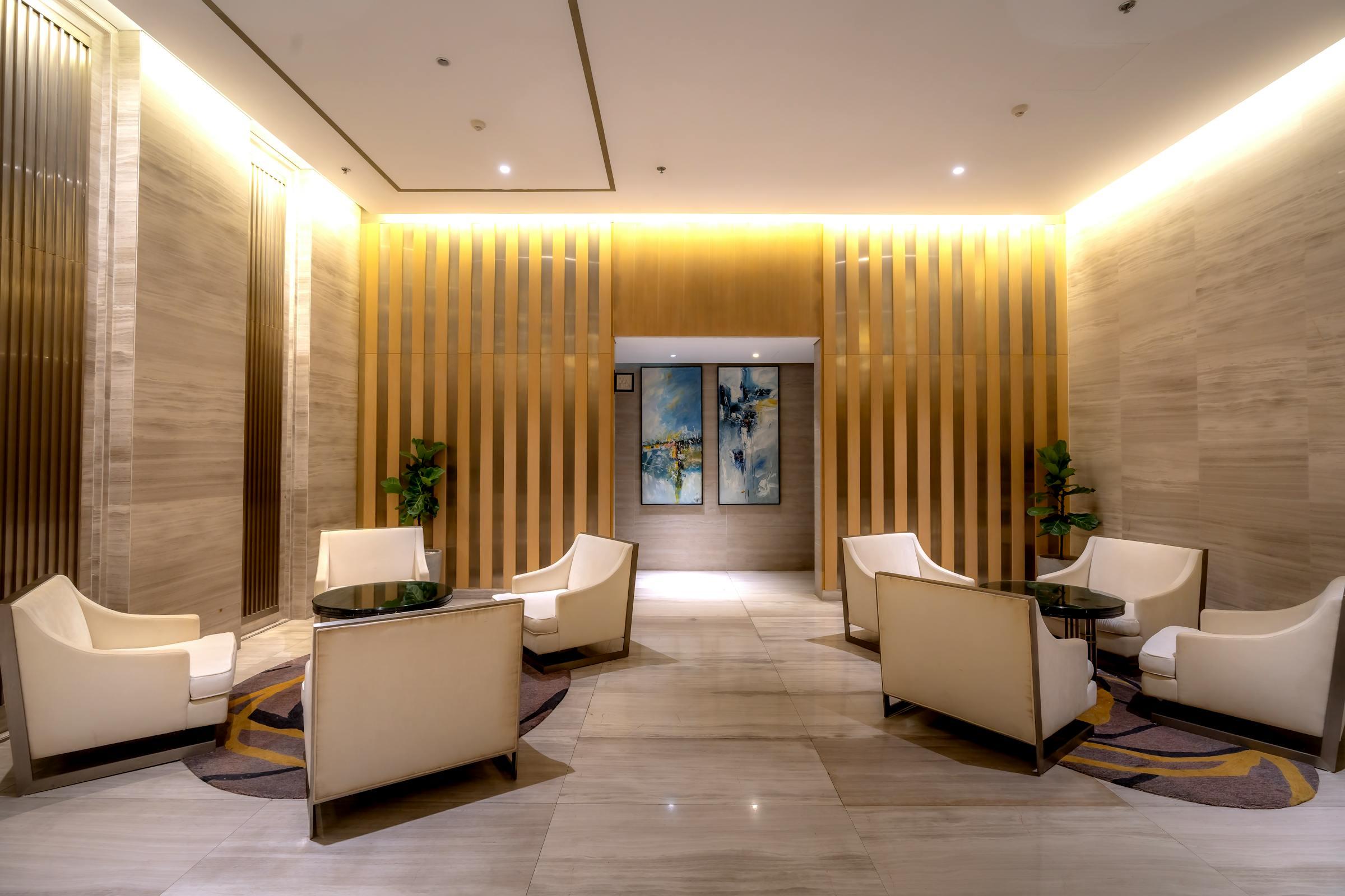 A private lounge in soft light, where a VIAIVE journey is planned before it is secured.