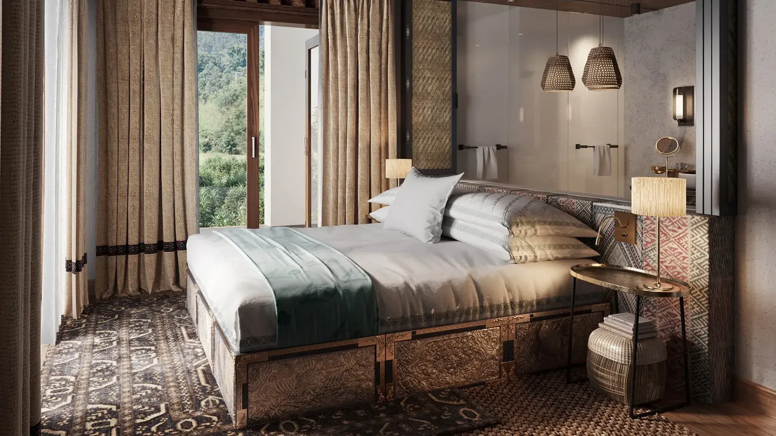 The bedroom of a family villa at andBeyond Punakha River Lodge, with a view onto the rice terraces.