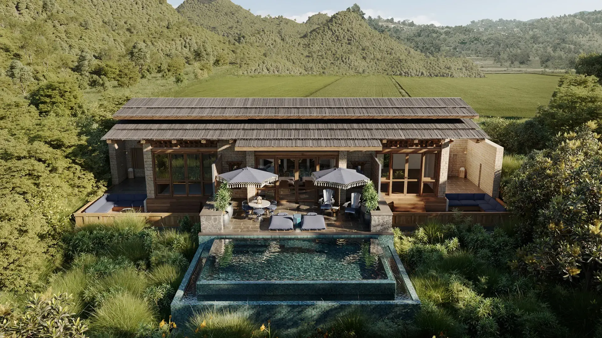 andBeyond Punakha River Lodge's family villa with a private plunge pool overlooking the rice terraces and Punakha valley.