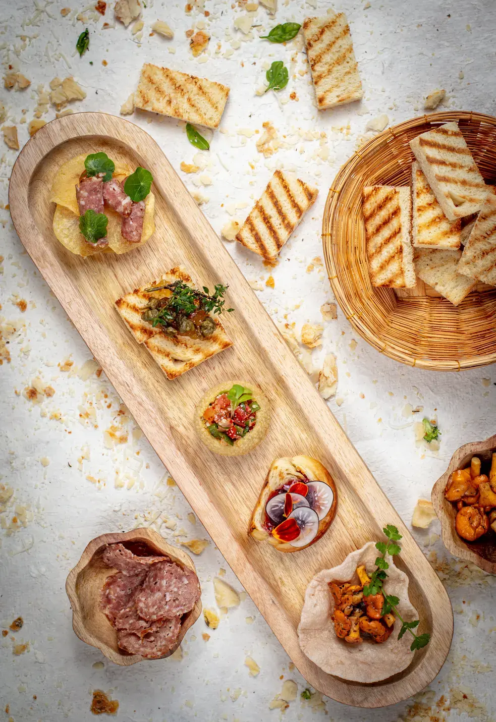 Canape tasting board at Bhutan Spirit Sanctuary featuring local ingredients and garnishes