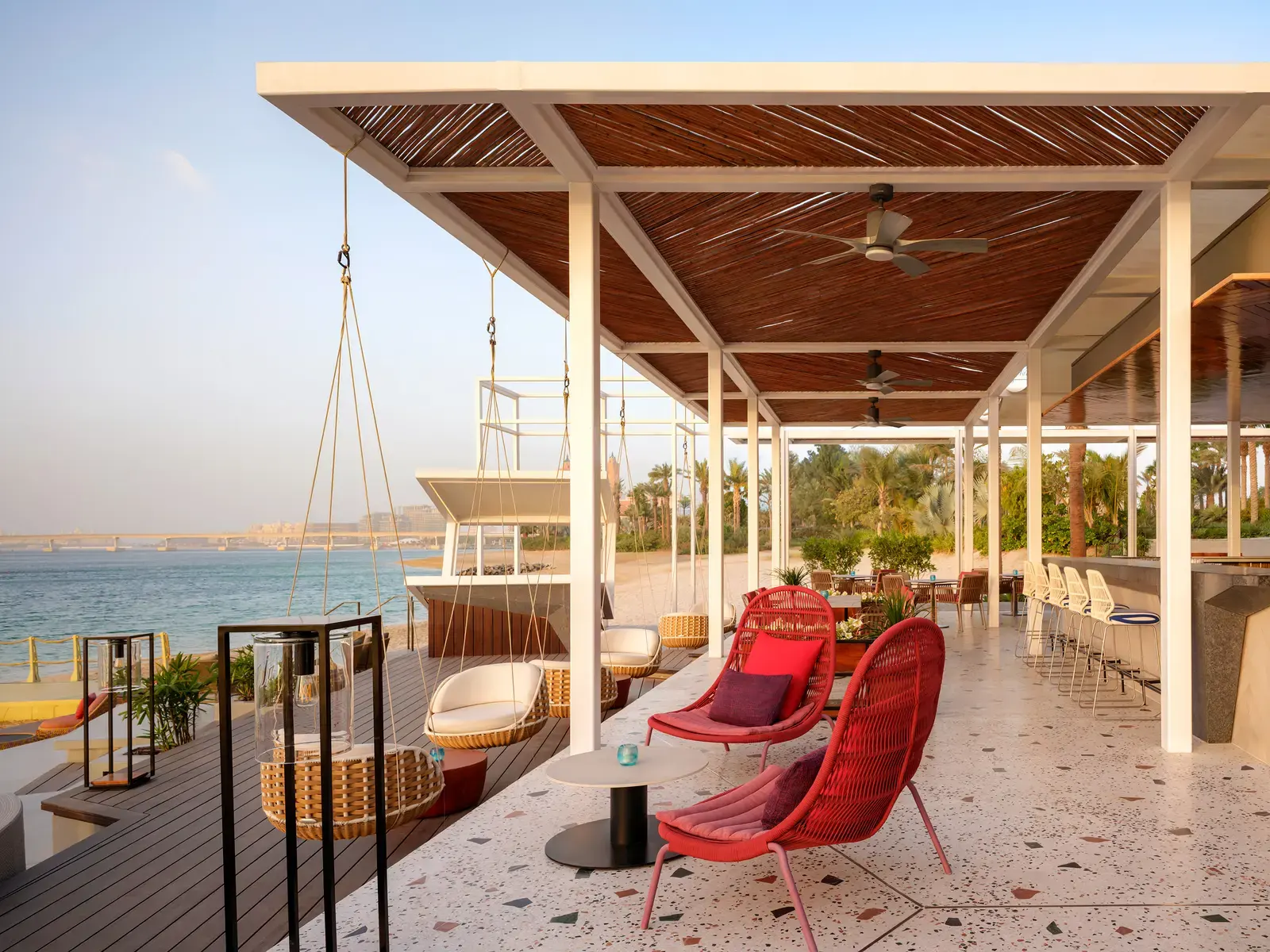 Atlantis The Royal's waterfront terrace lounge seating.