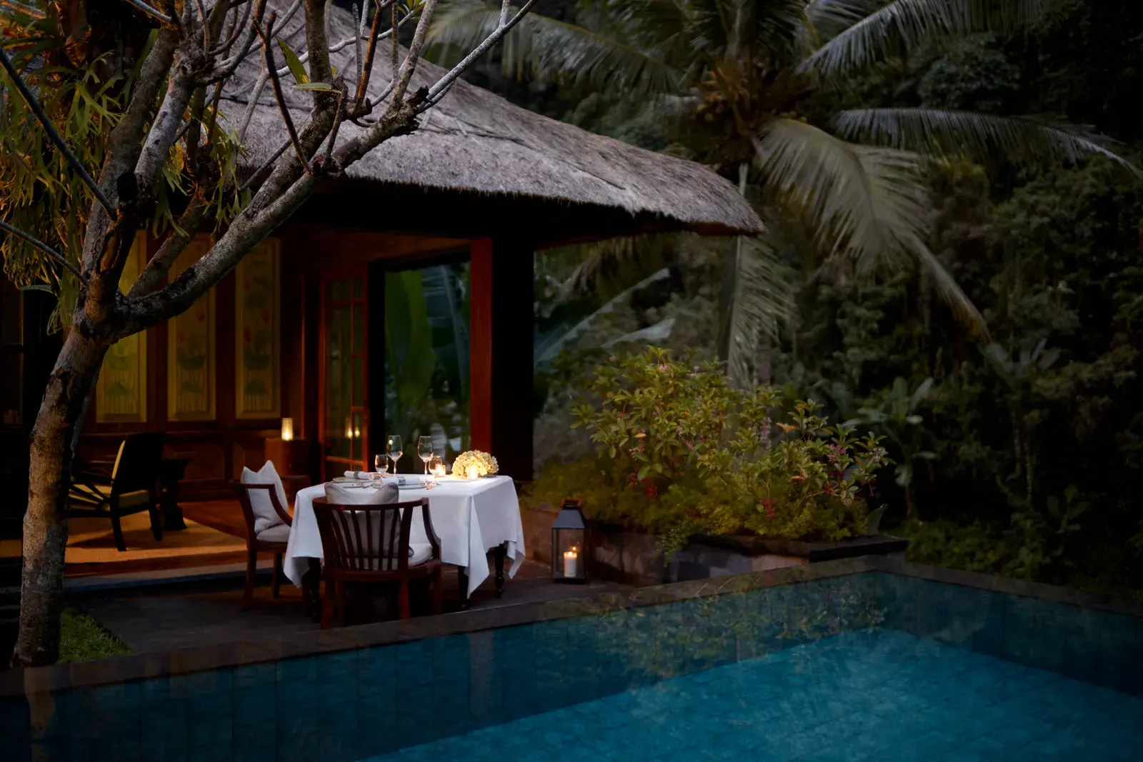 In-villa romantic dining setup at Mandapa, a Ritz-Carlton Reserve
