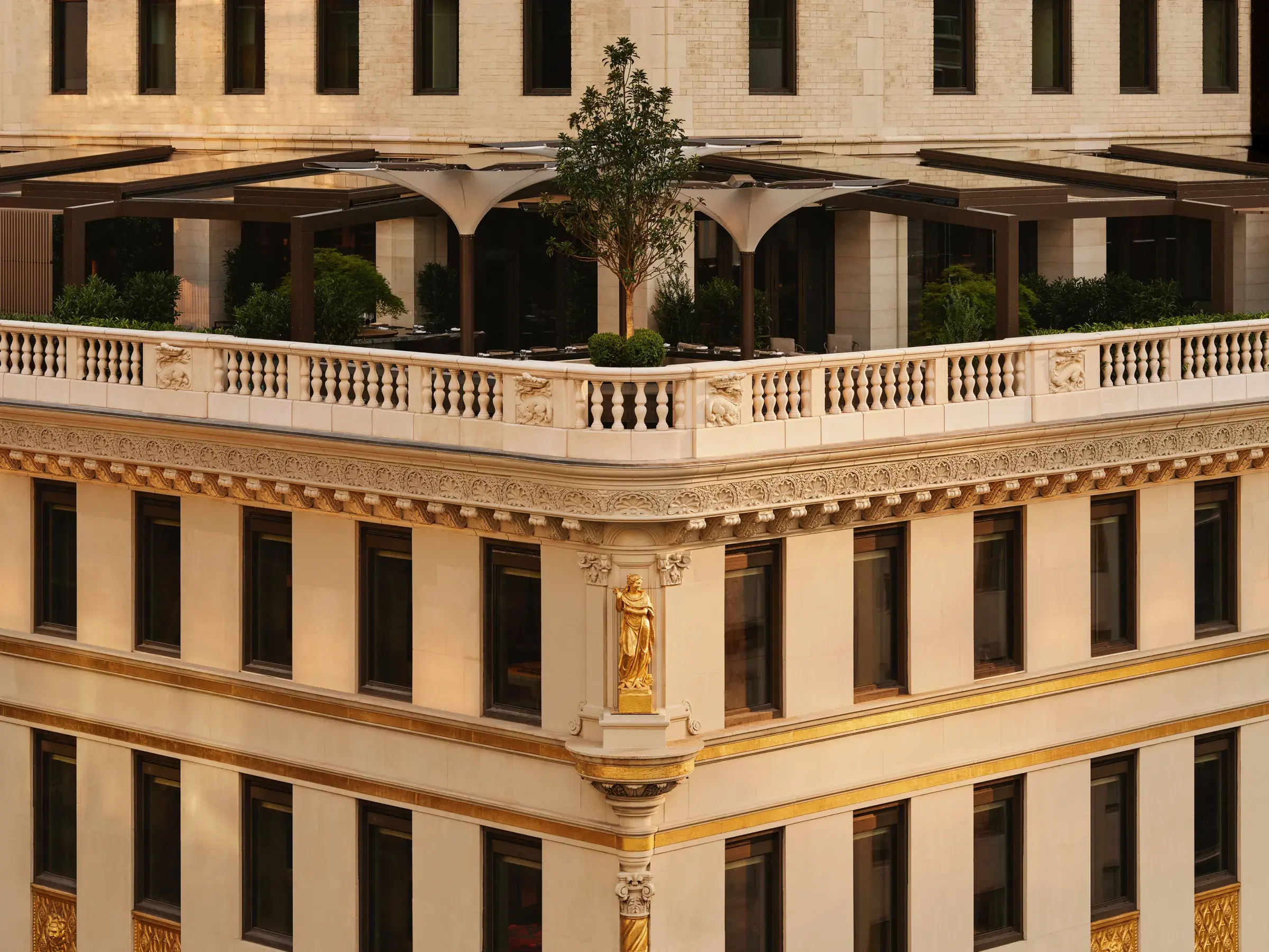 Aman New York in the Crown Building with its terrace and ornate facade