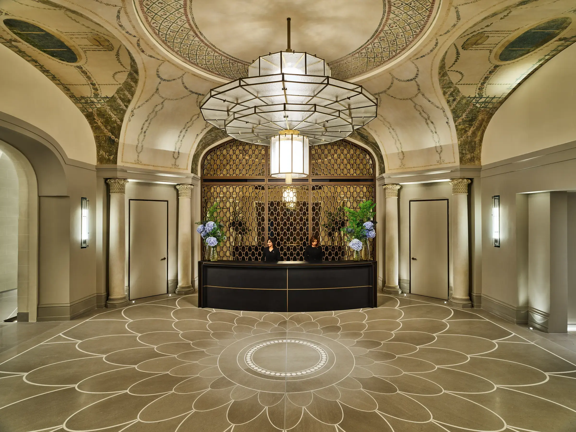 The restored Art Deco lobby rotunda at Hôtel Lutetia, Saint-Germain-des-Prés, with its patterned mosaic floor and original vaulted ceiling