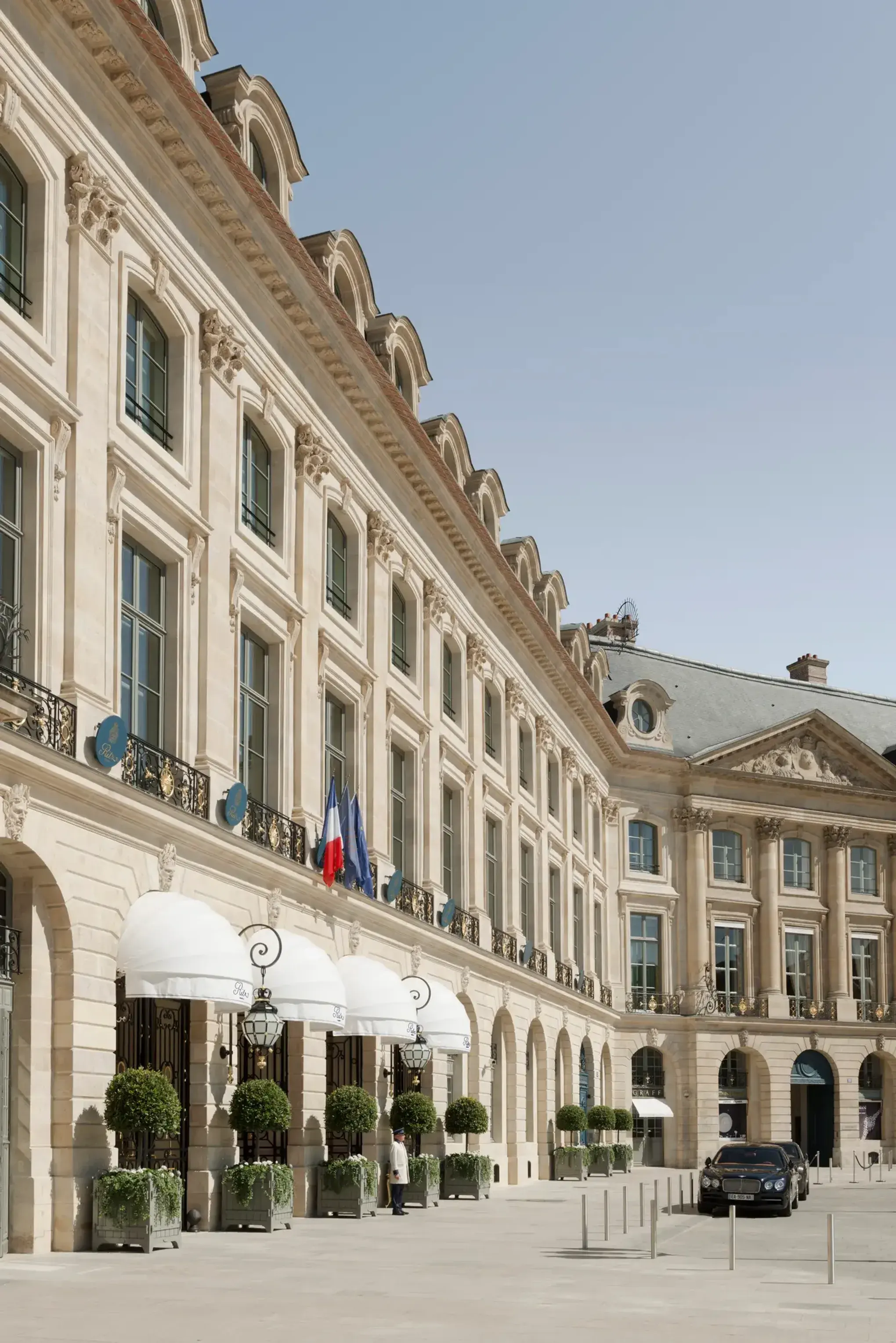 The Place Vendôme facade of Le Ritz Paris in daylight
