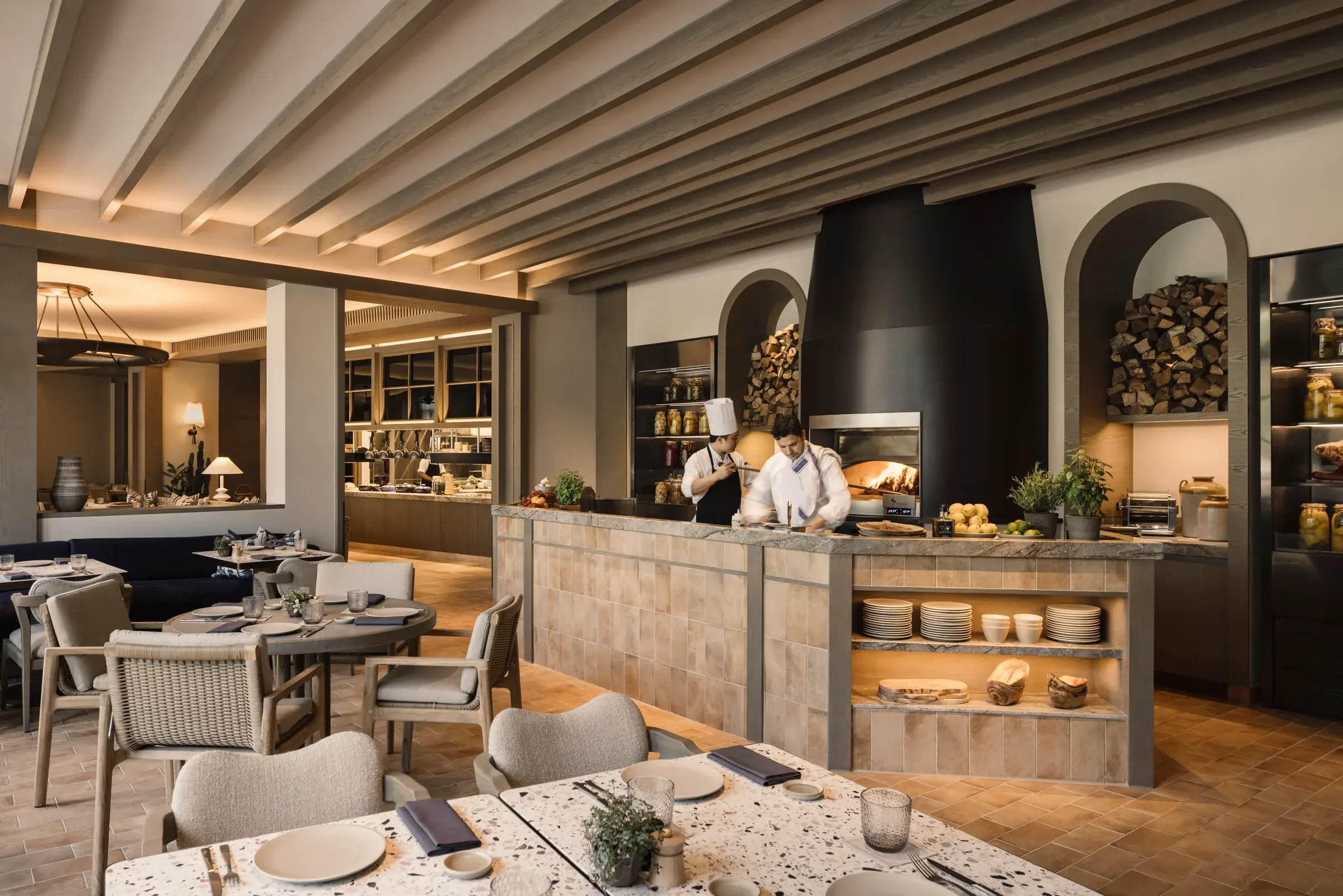 Open kitchen and wood-fired oven at Fiamma restaurant, Capella Singapore