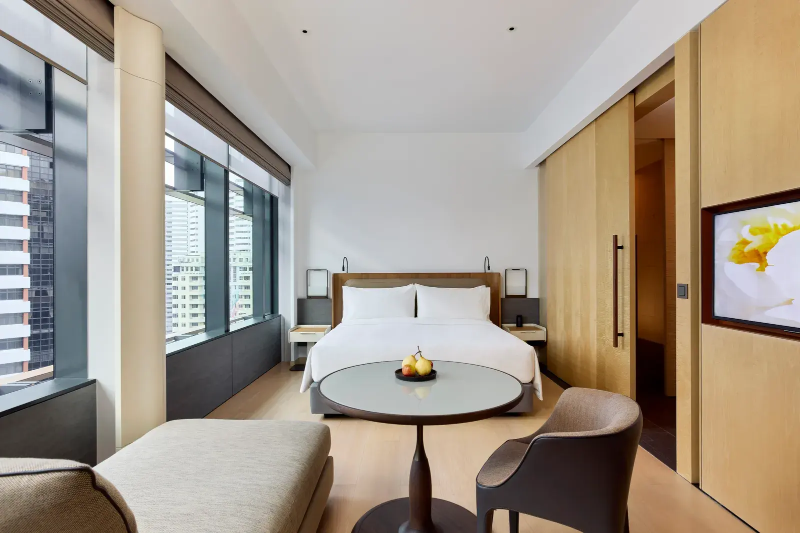 Emerald Room guestroom with city view at COMO Metropolitan Singapore