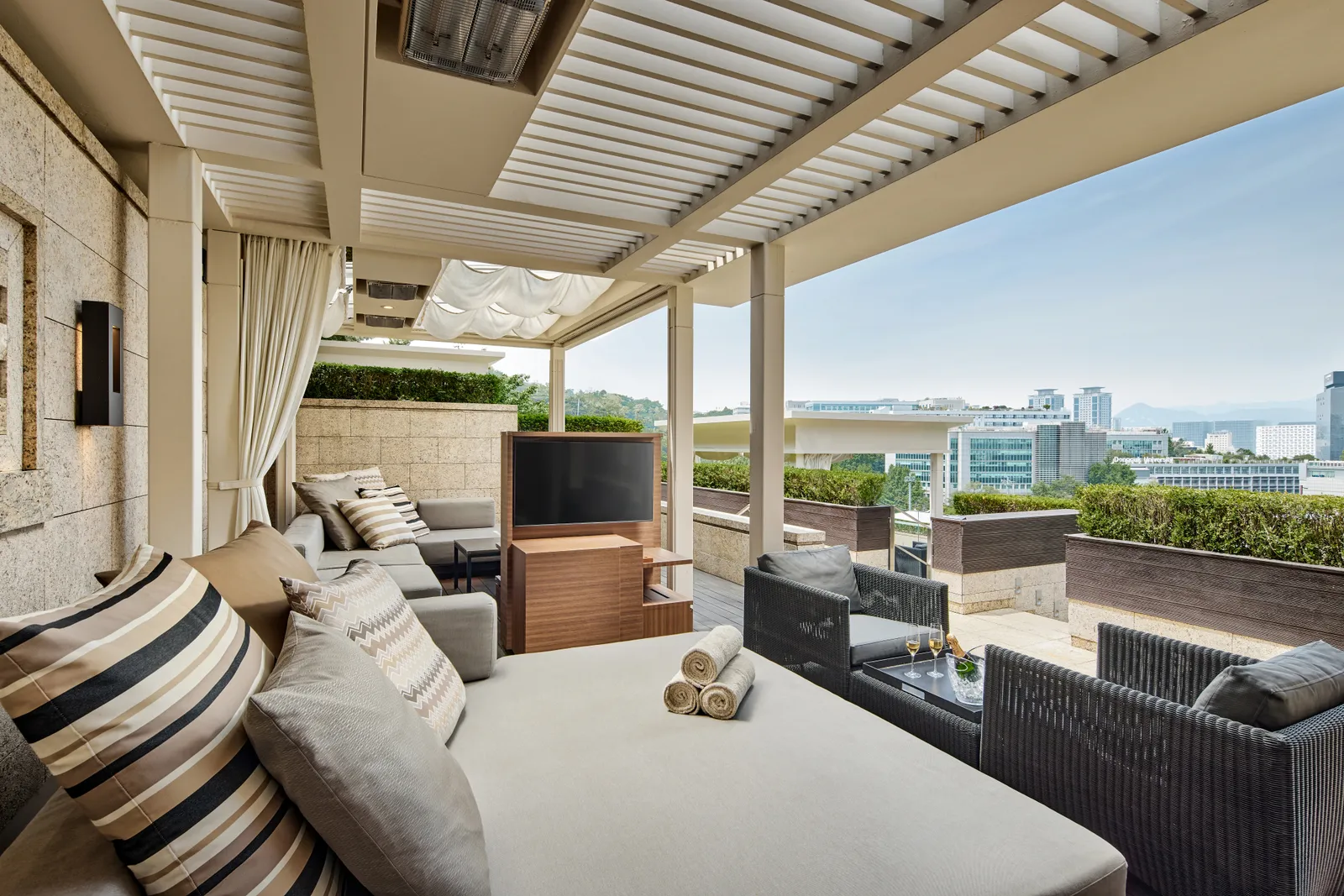 Rooftop cabana terrace at The Shilla Seoul overlooking the city