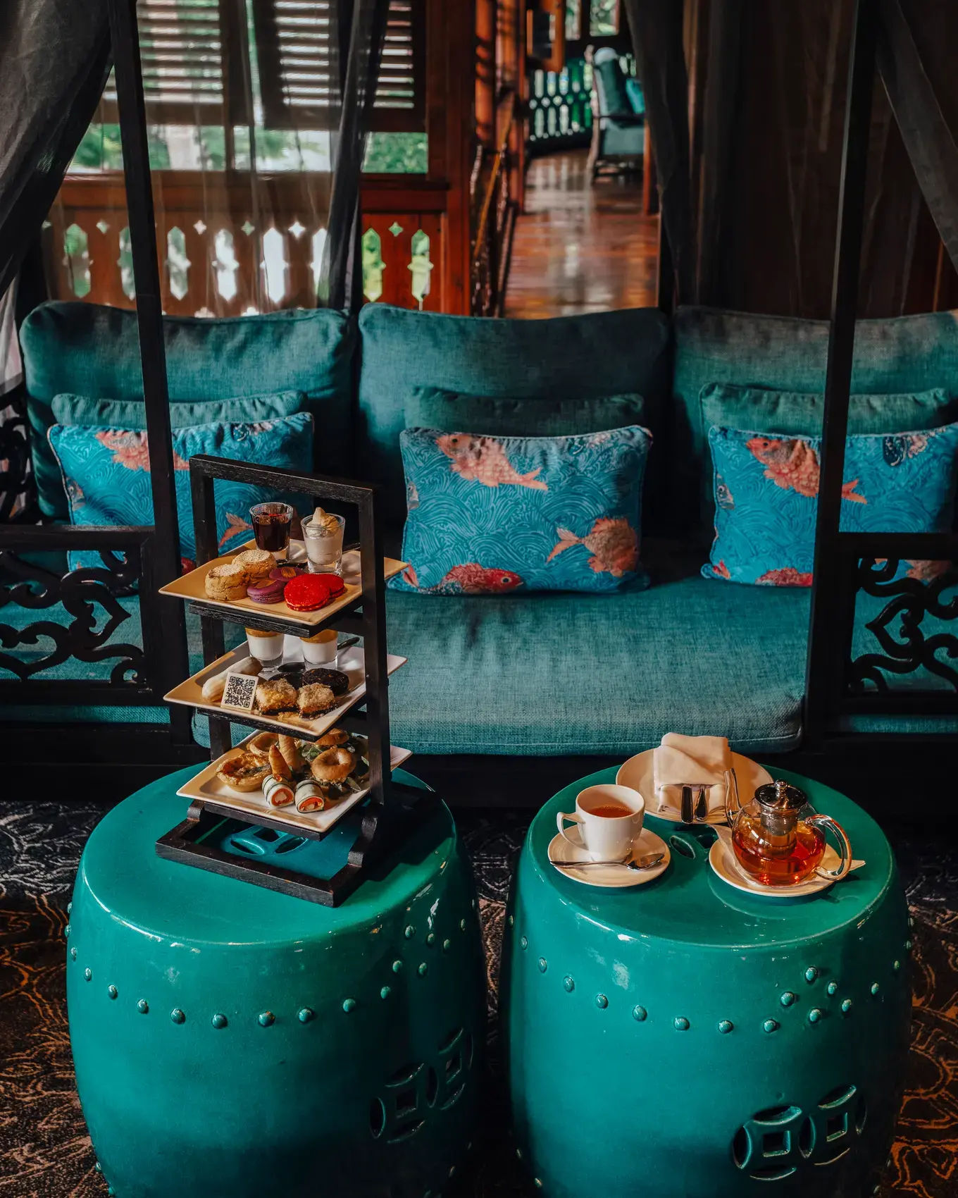 Afternoon tea service on the veranda at 137 Pillars House Chiang Mai