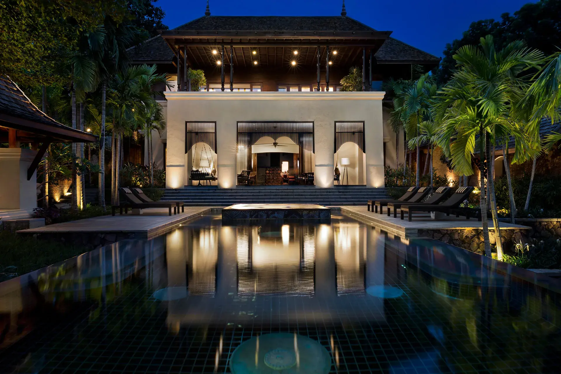 Twilight view of a pool villa at Four Seasons Resort Chiang Mai