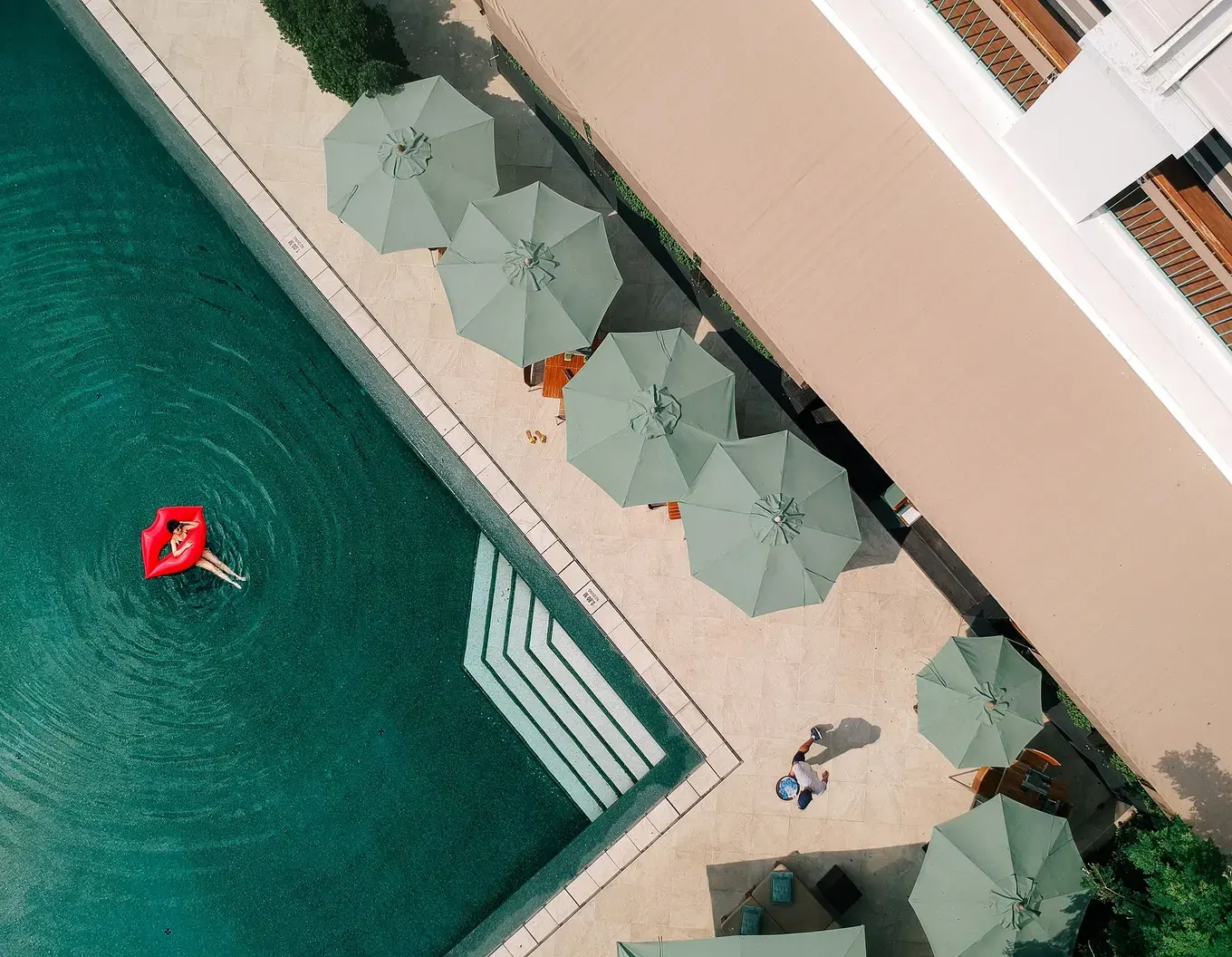 Aerial view of the swimming pool and gardens at The Sukhothai Bangkok