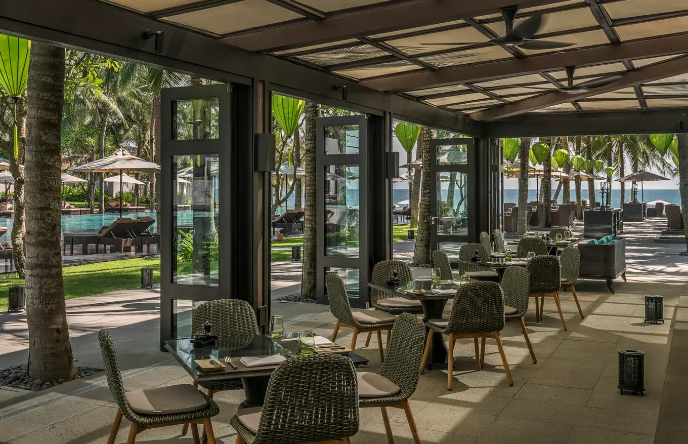 Open-air dining pavilion at Four Seasons Resort The Nam Hai, Vietnam