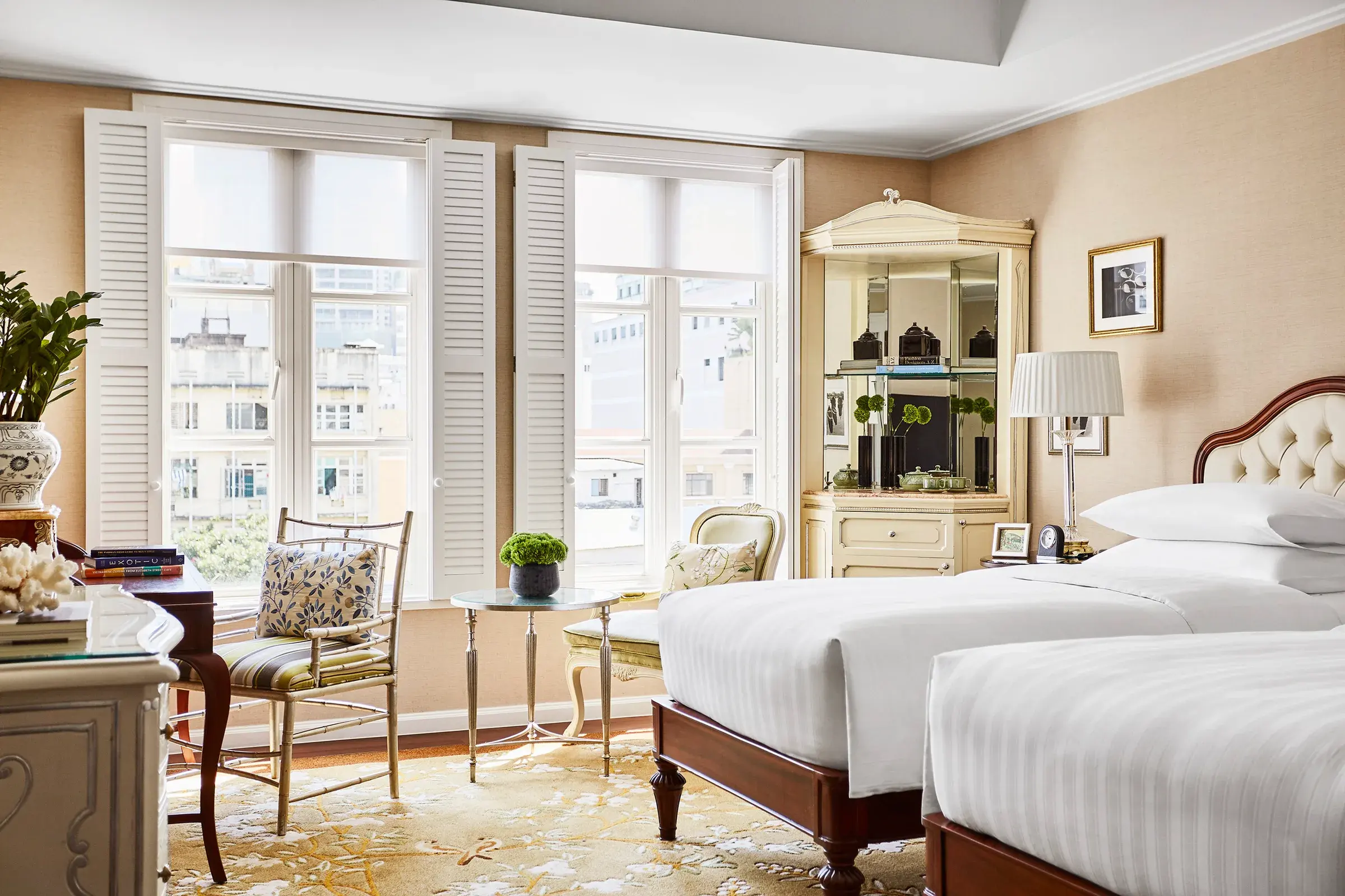 Twin-bed guest room with cream furnishings at Park Hyatt Saigon, Vietnam