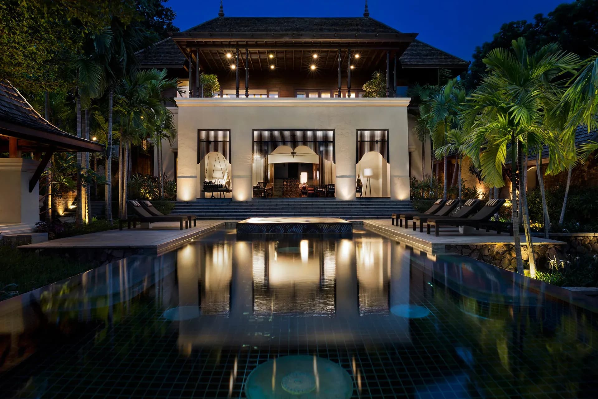 Twilight view of a pool villa at Four Seasons Resort Chiang Mai