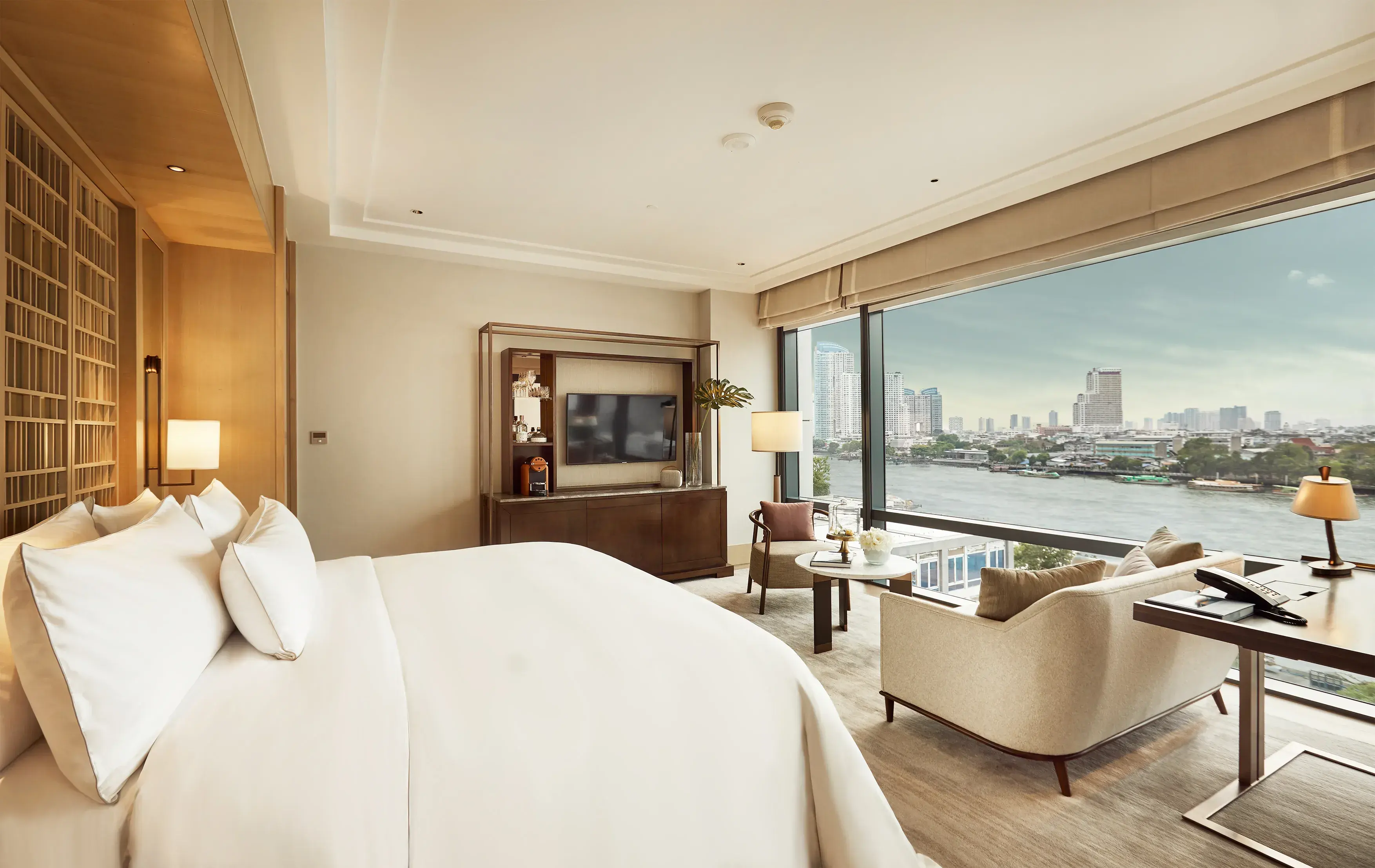 Capella Bangkok Riverfront Premier room category — the river-facing category this section compares against the Ascott serviced-apartment category logic.