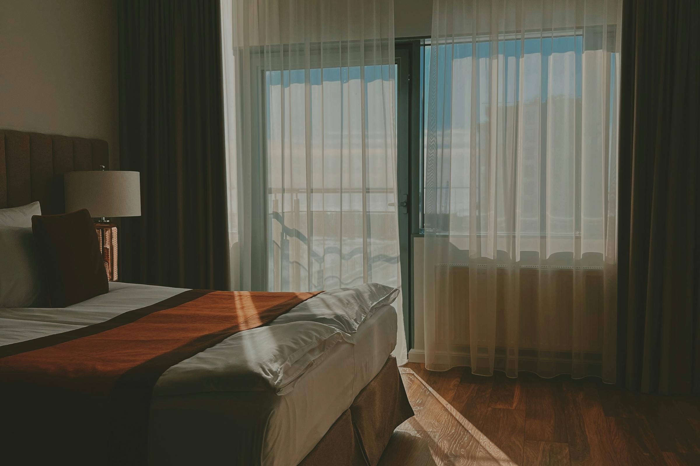 Quiet suite interior with warm daylight